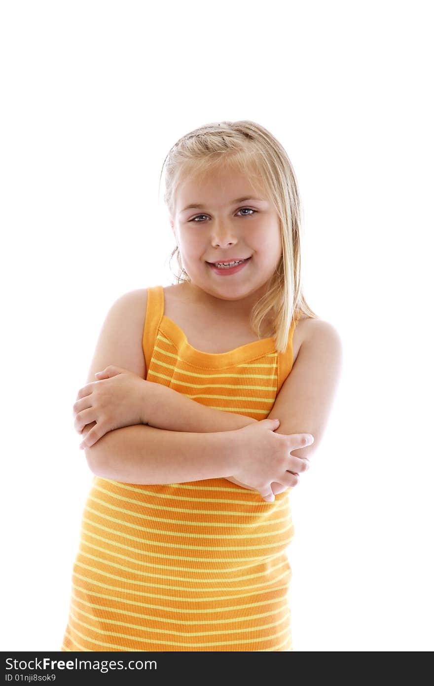 Cute little girl wearing orange.