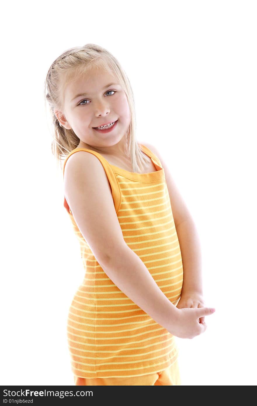 Cute little girl wearing orange.