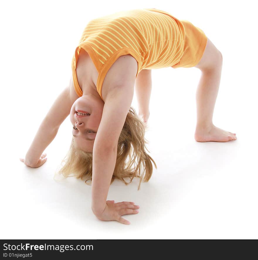 Cute little girl wearing orange.