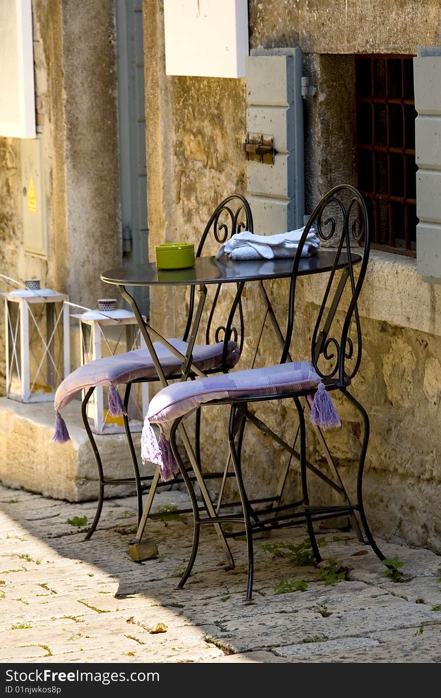 Chairs and table in a mediterran city. Chairs and table in a mediterran city