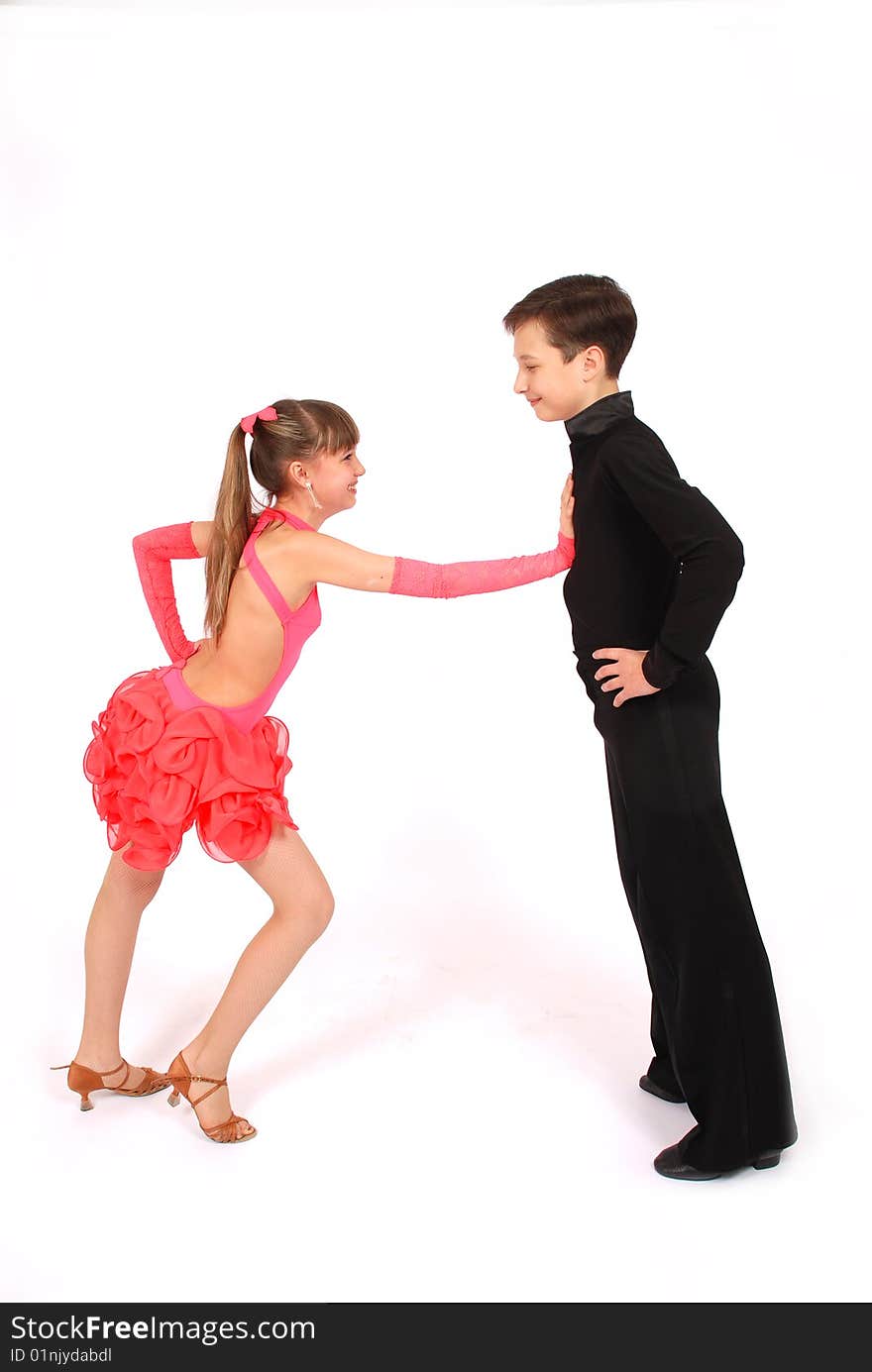 Boy and girl dancing ballroom dance on white background