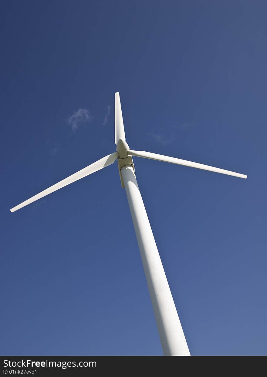 Wind power station towards blue sky