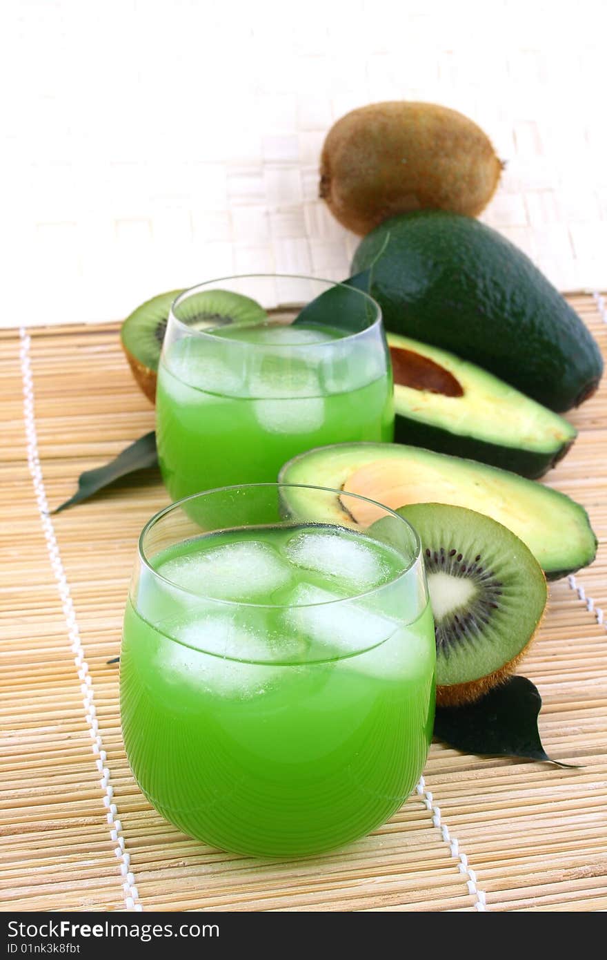 Avocado and avocado juice in a glass