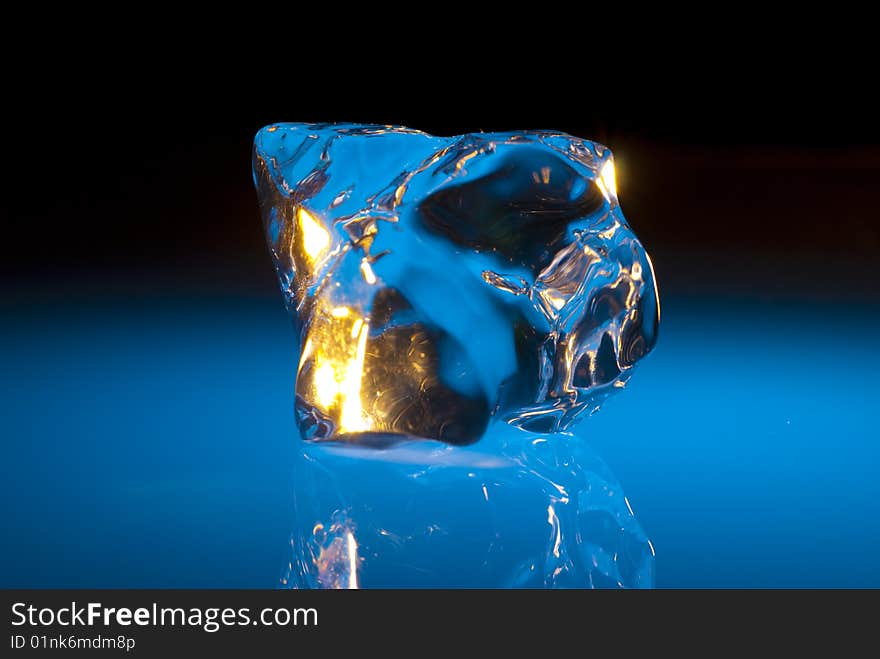 Ice cube on blue sculpture