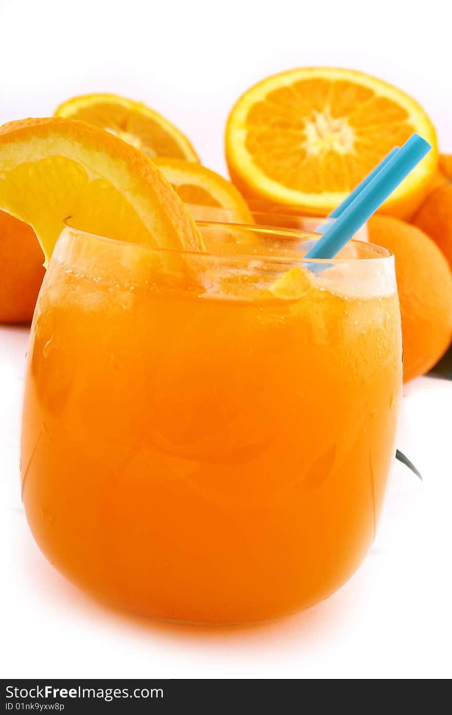 Orange and orange juice in a glass