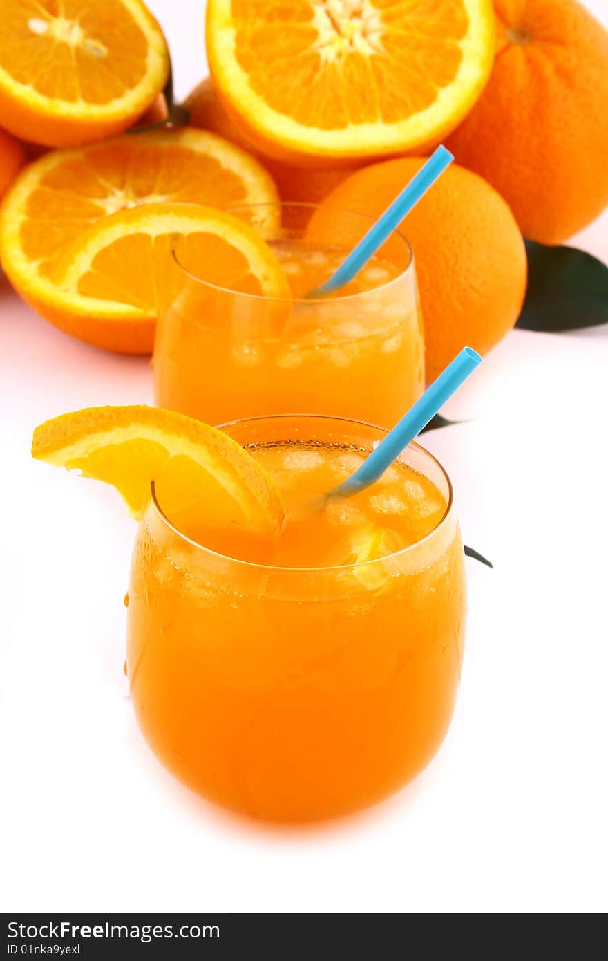 Orange and orange juice in a glass