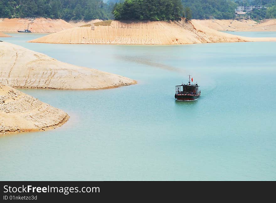 The Tourist Boat Sailing On Lake