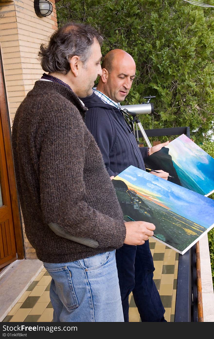 A brush painting a sunset of a reddish color