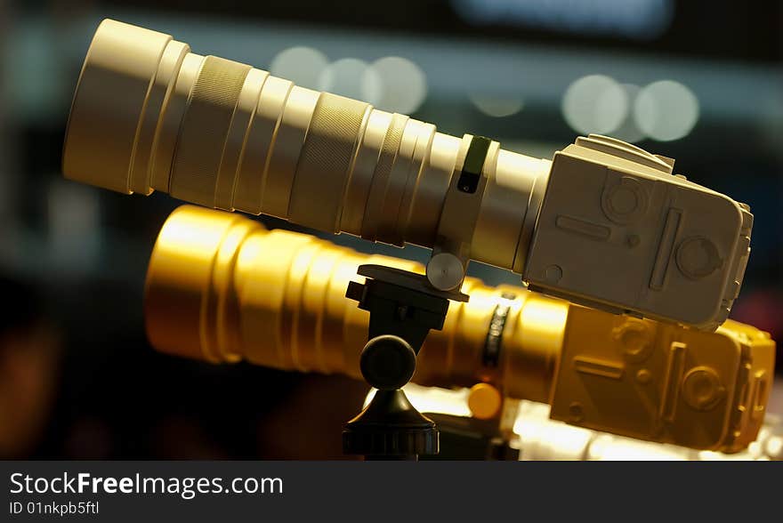 Golden camera and large lens model. Golden camera and large lens model