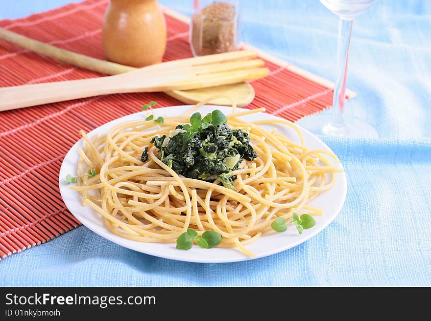 Spinach with black olives