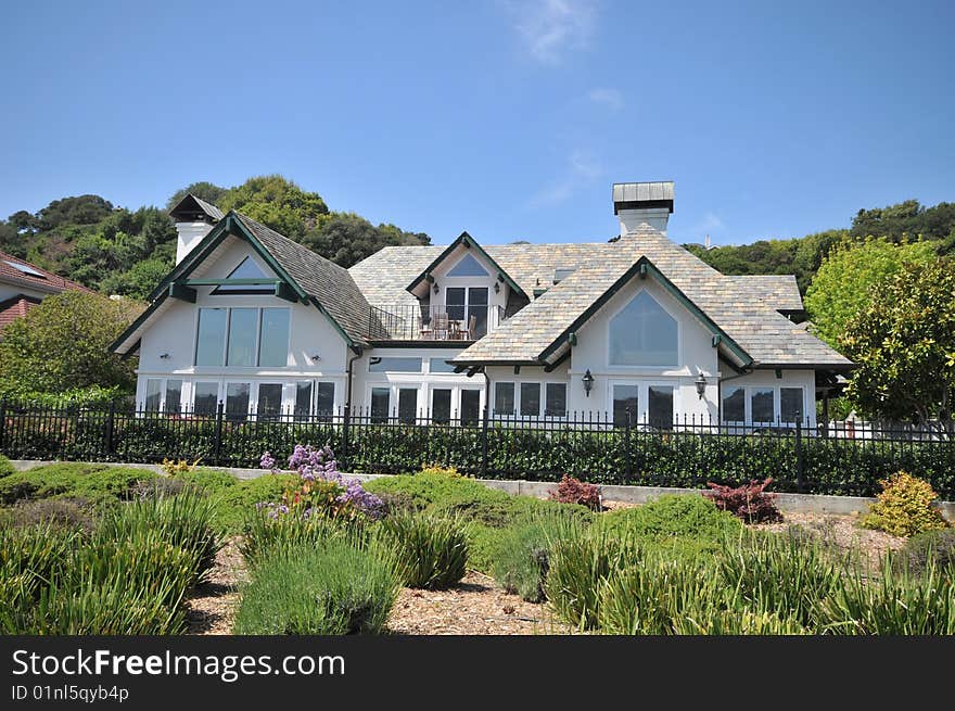 House surrounded by trees and fence