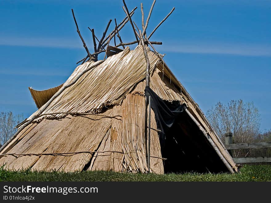 Indian tepee made with bark and branches. Indian tepee made with bark and branches.