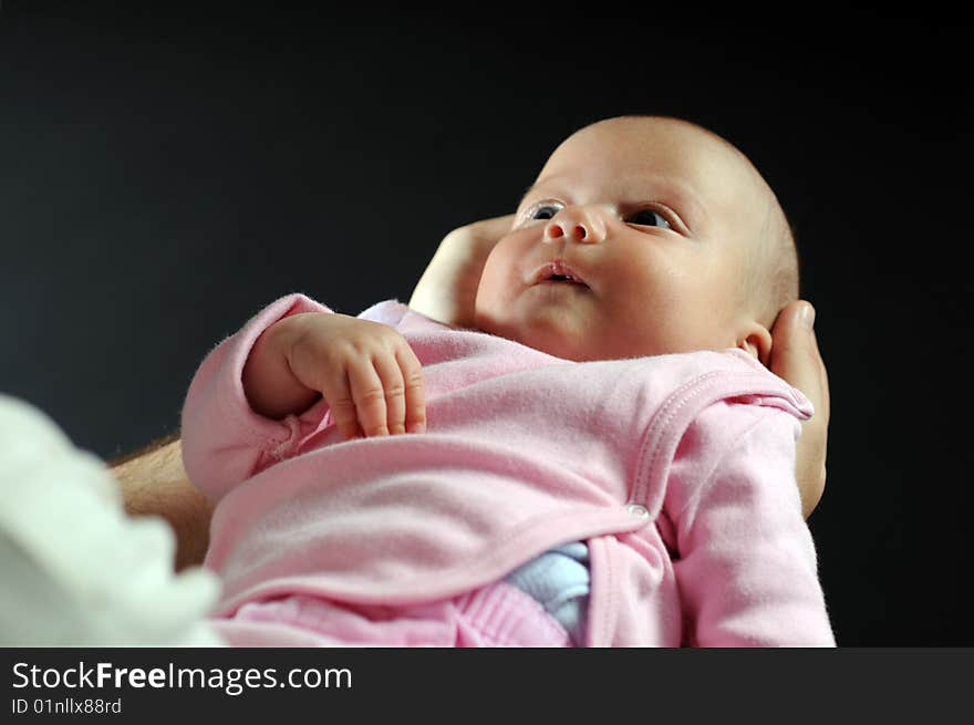 Little baby in dad's hands