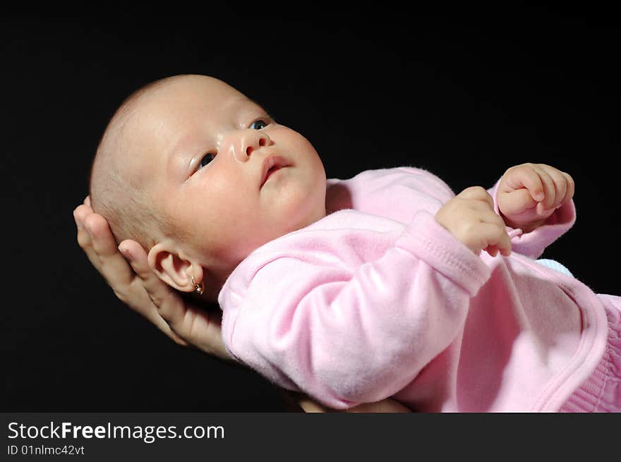 Little baby in dad's hands