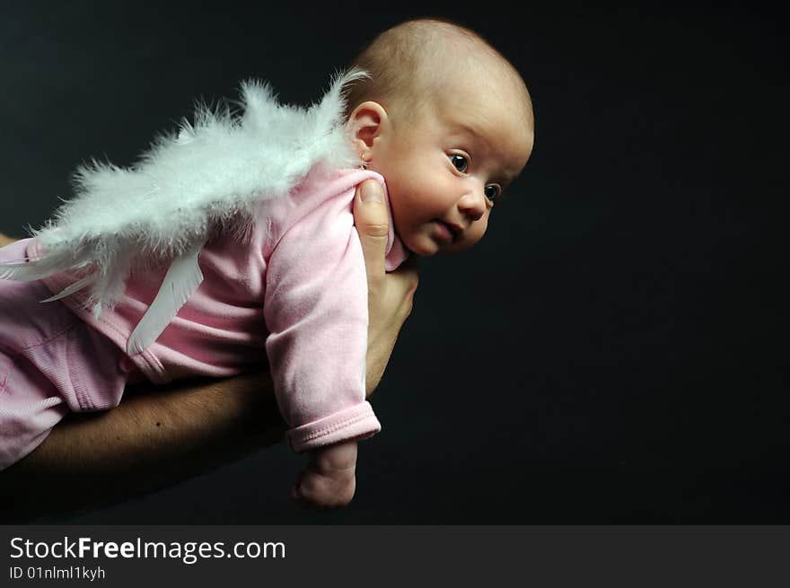 Little baby in dad's hands