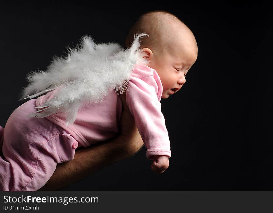 Little baby in dad's hands