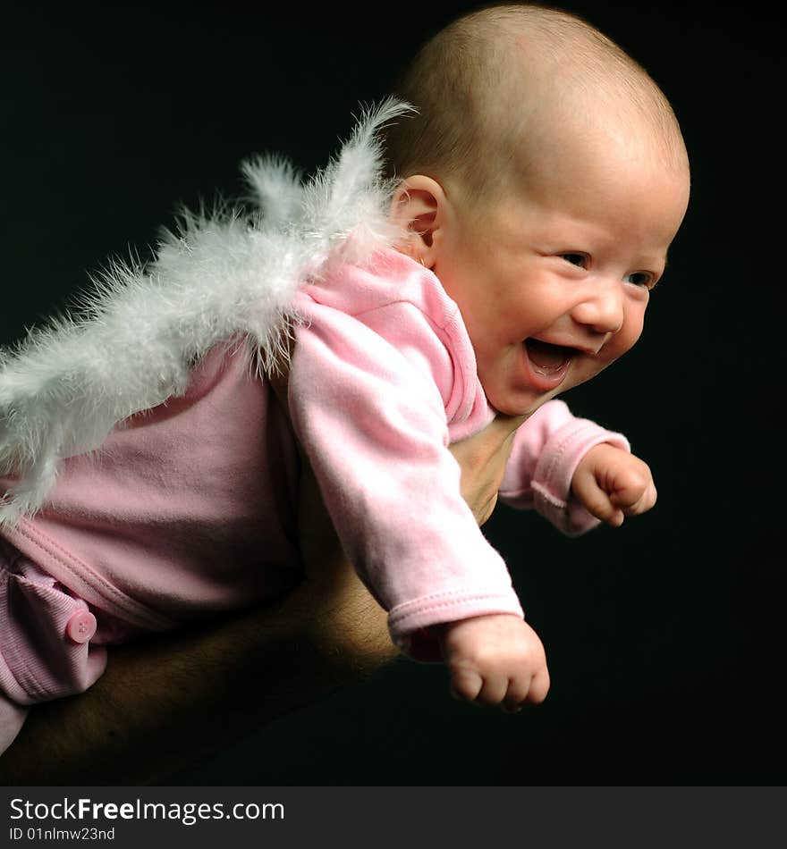 Little baby in dad's hands