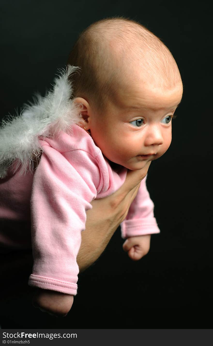 Little baby in dad's hands