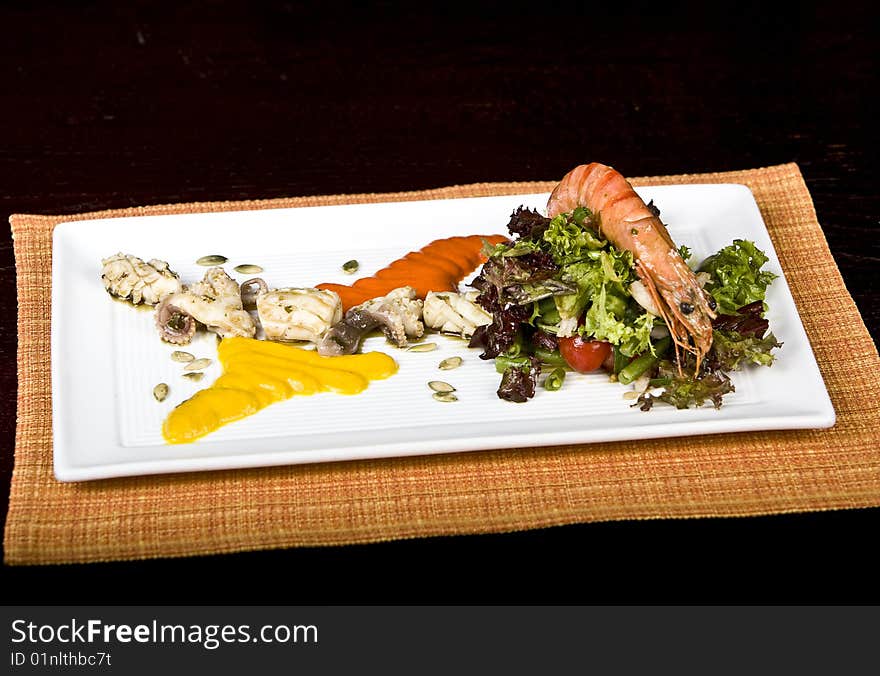 Fried shrimps decoration pineapple and greenery