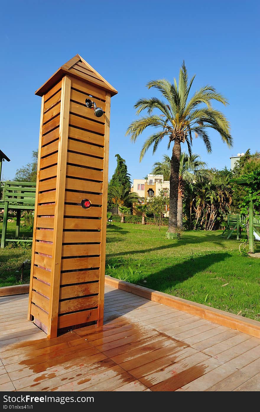 Shower near swimming pool in tropical resort