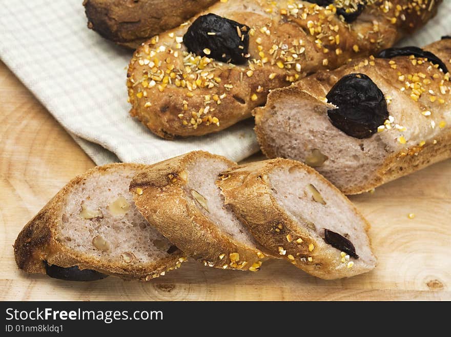 Fresh baguettes on a wood board