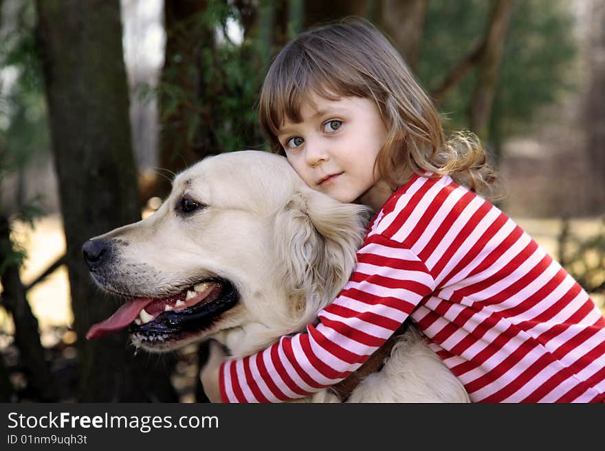 Little girl with big retriever outdoor. Little girl with big retriever outdoor