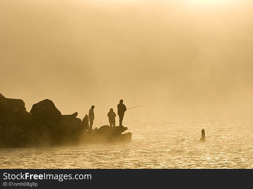 Anglers In The Mist