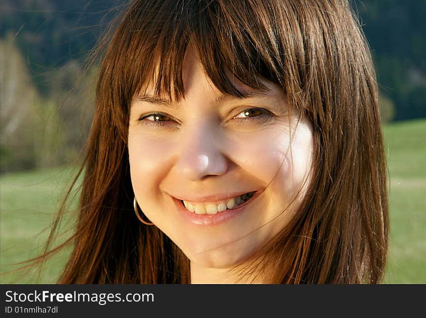 Portrait shot of a beautiful caucasian woman. Happy and smiling. Portrait shot of a beautiful caucasian woman. Happy and smiling