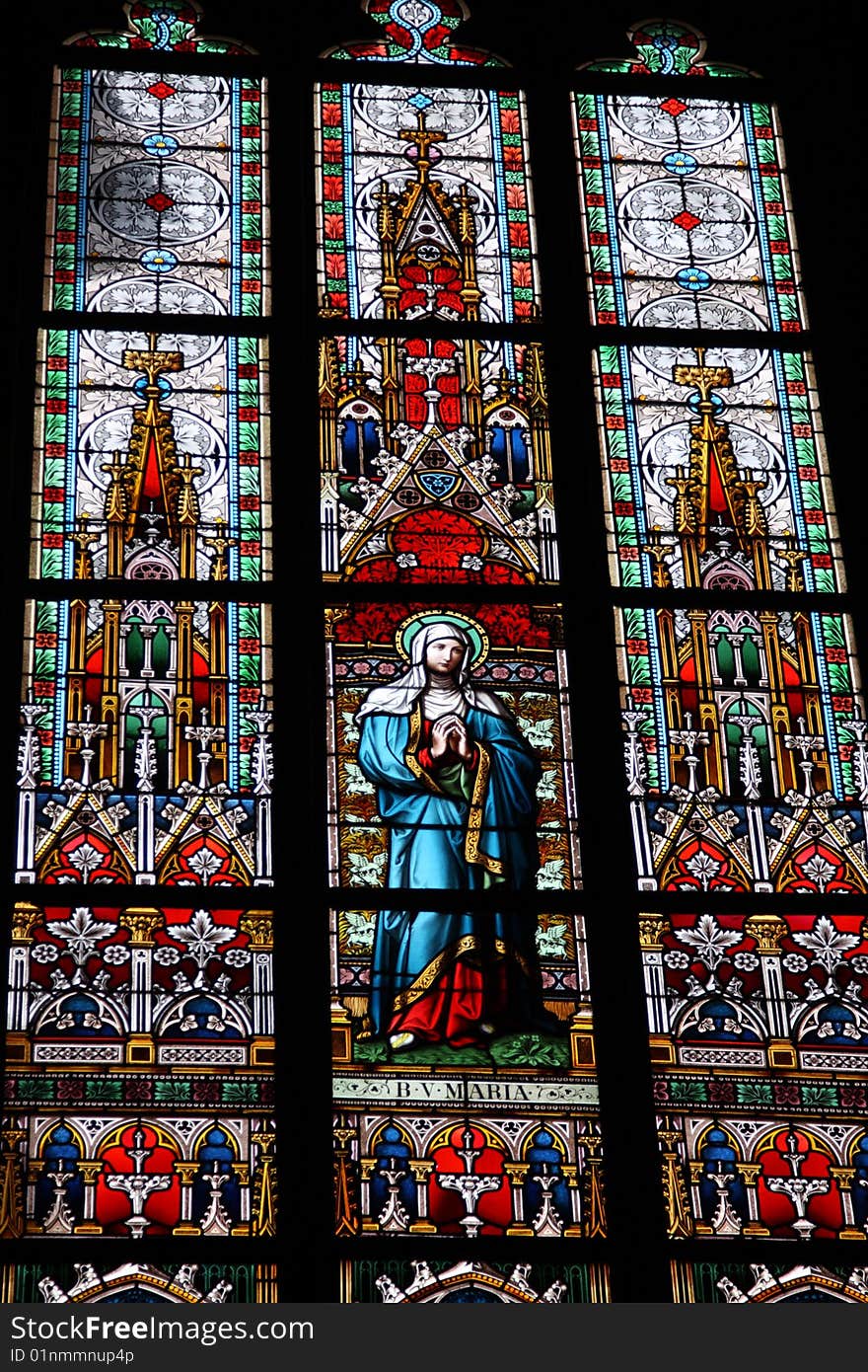 Colorful stained-glass window in St.Vitus cathedral in Czech capital Prague