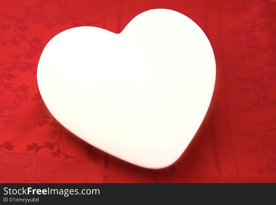 Heart on red background