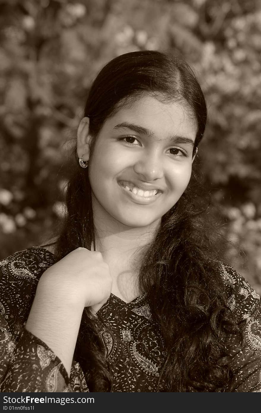 A young Indian teenager with her magical innocent smile.