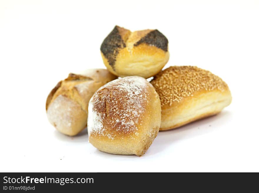 Many buns with sesame seeds , macro shot