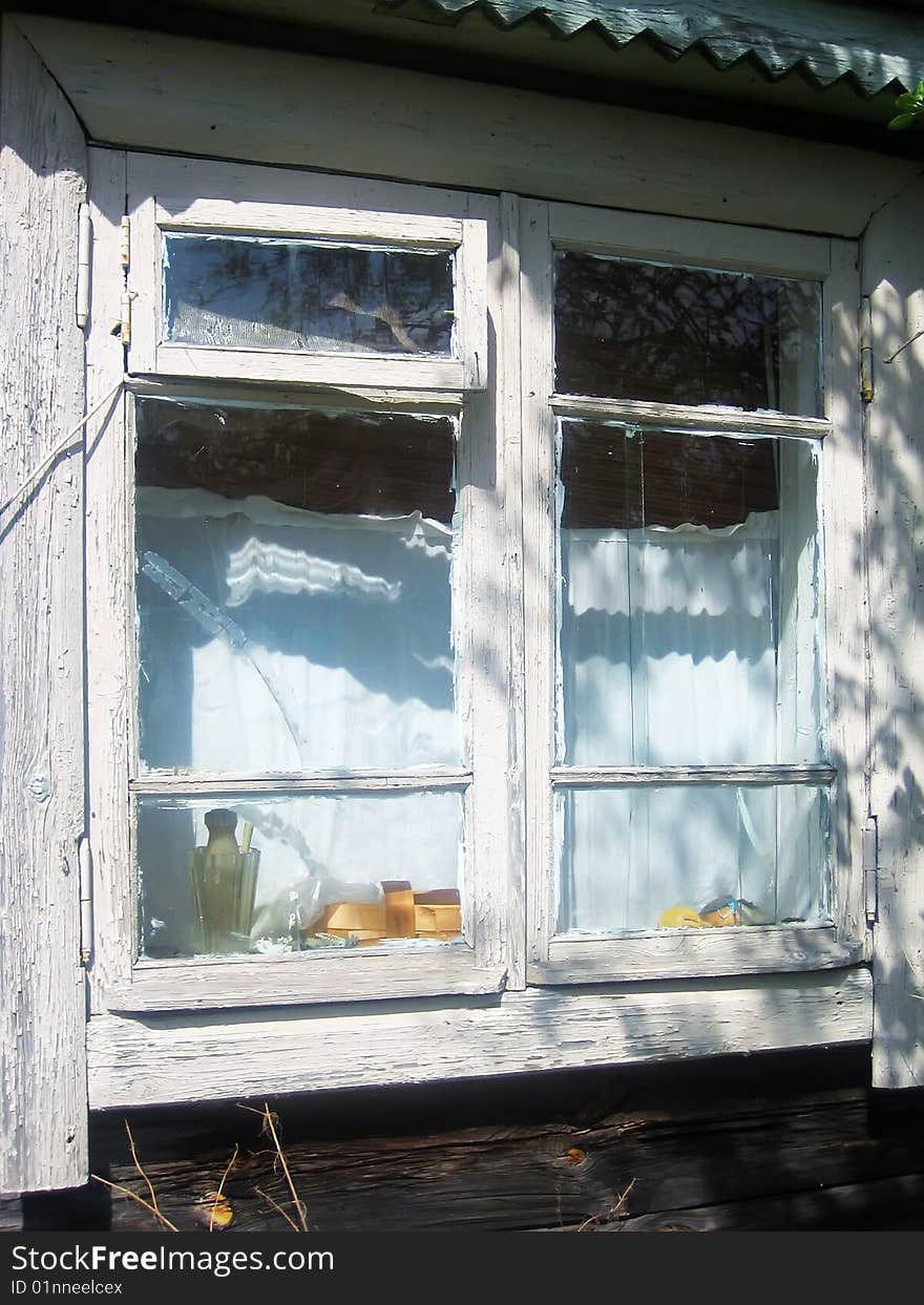 Old wooden white barn window. Old wooden white barn window