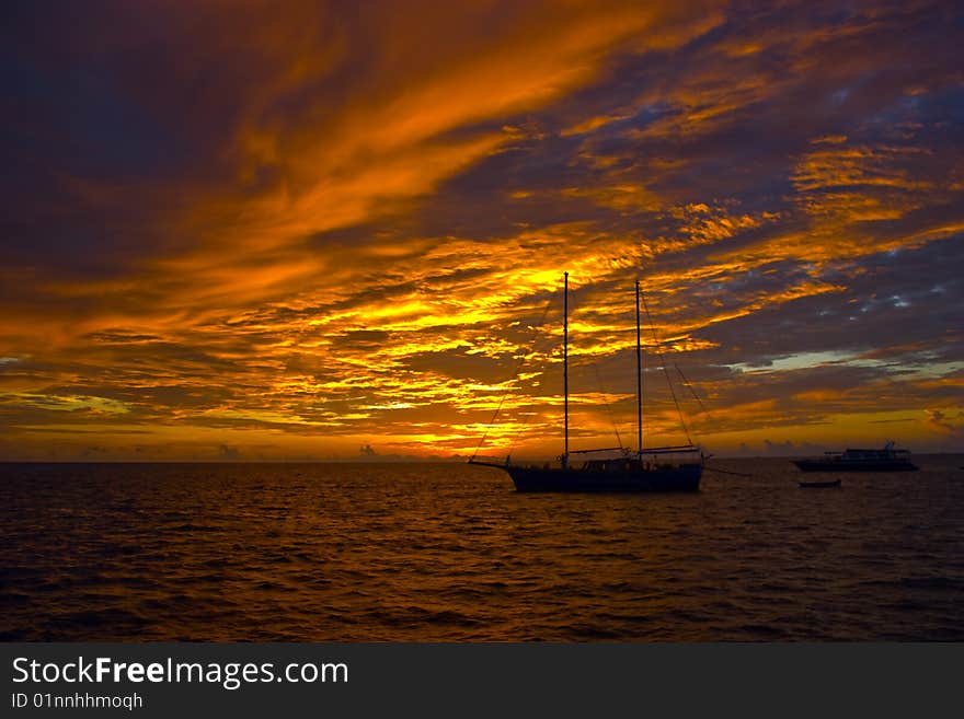 Golden sunset with the ships