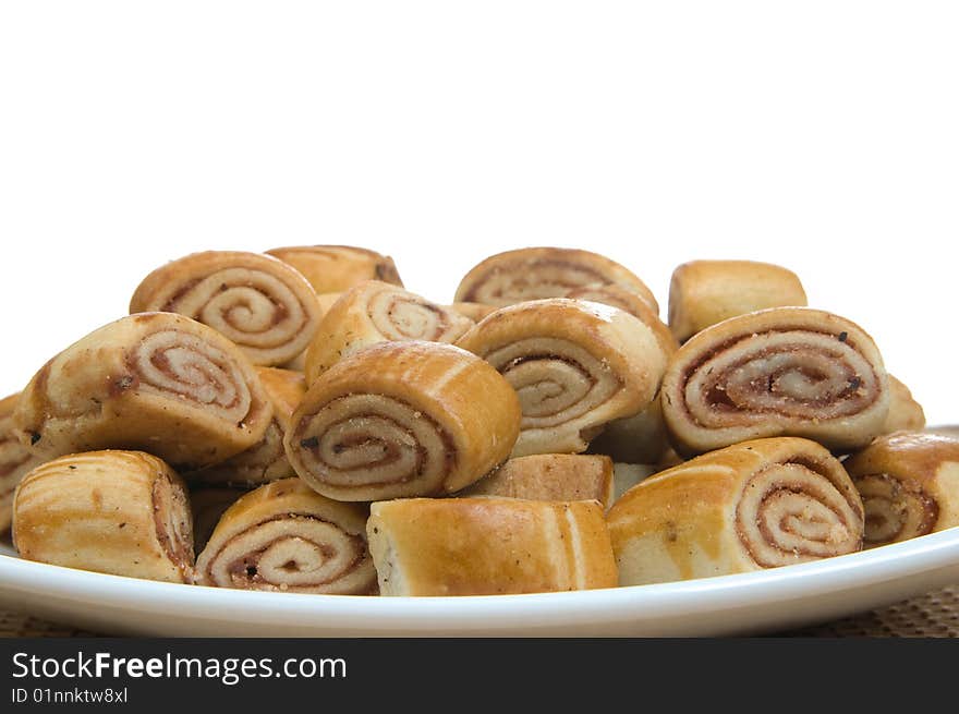 Cookies, slices on a white plate