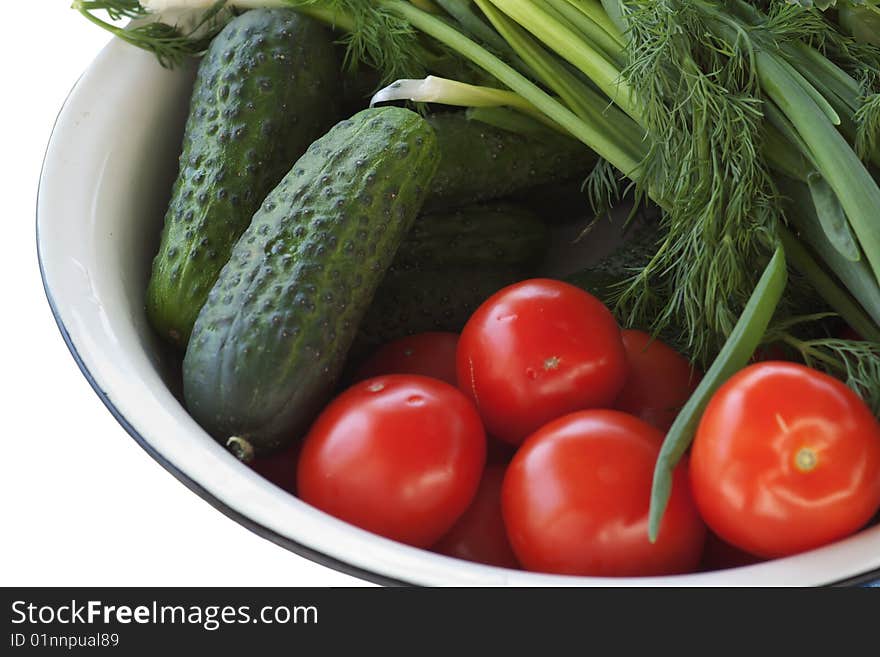 Fragment of a bowl with vegetables inside