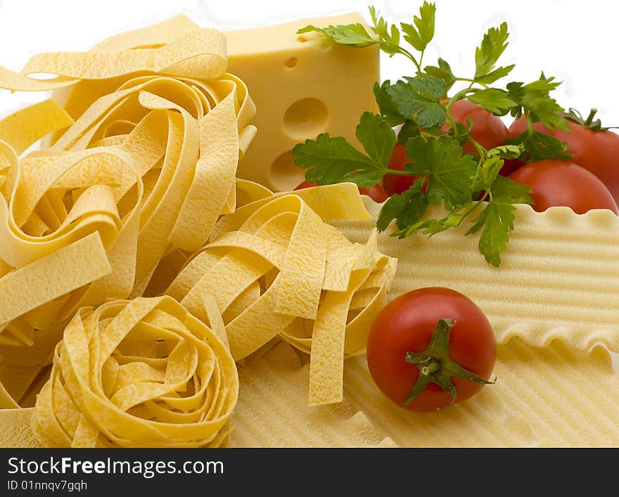 Spaghetti and mature tomato isolated on a white background. Spaghetti and mature tomato isolated on a white background