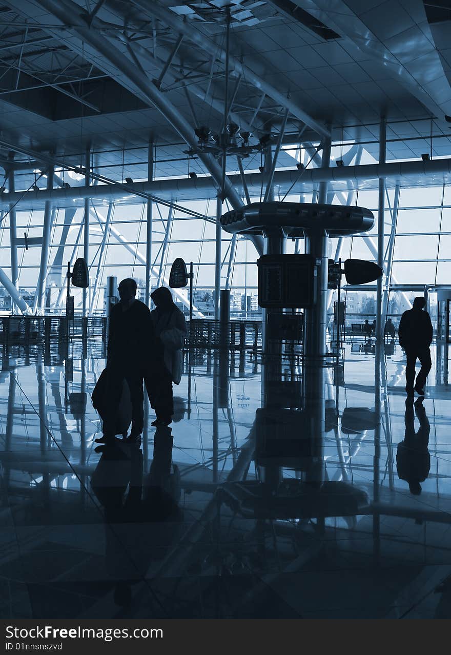 People inside of the airport. People inside of the airport