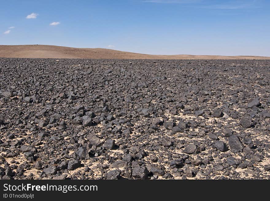 Black rocks in desert - Jordan, Middle East. Black rocks in desert - Jordan, Middle East