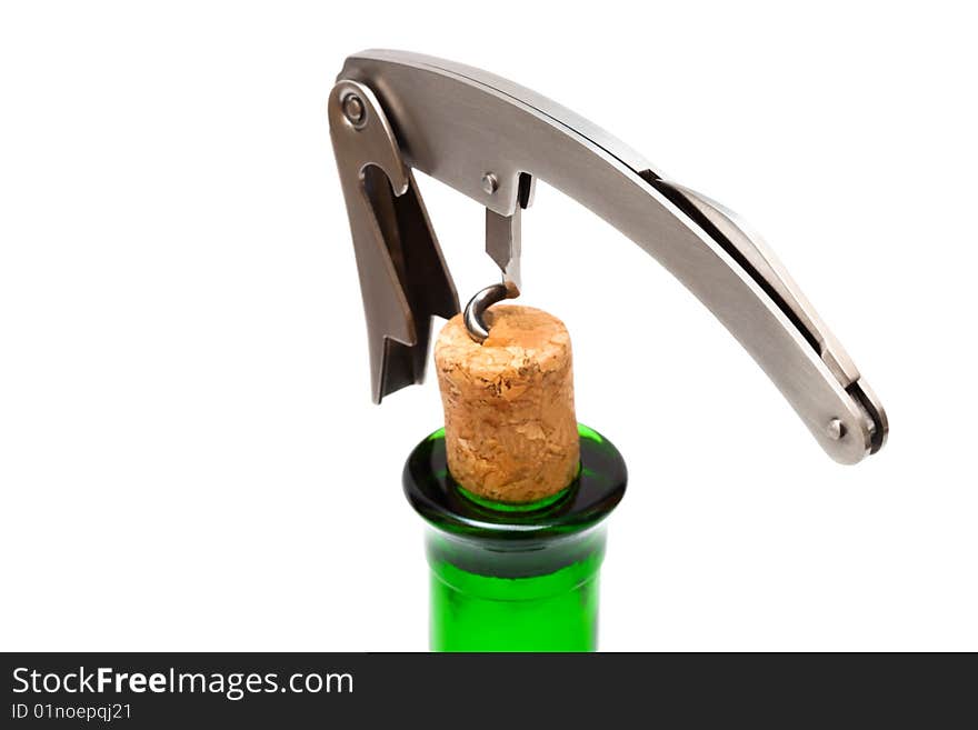 Corkscrew, cork and bottle on a white background