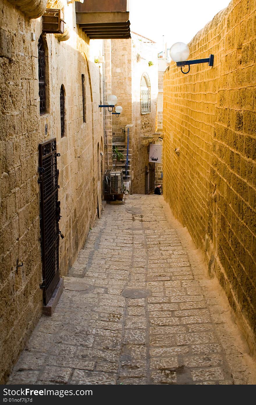 A street in the Old Jaffa, Tel-Aviv, Israel. Jaffa became a bohemian area hosting many talented painters, sculptors and craftspeople. A street in the Old Jaffa, Tel-Aviv, Israel. Jaffa became a bohemian area hosting many talented painters, sculptors and craftspeople.