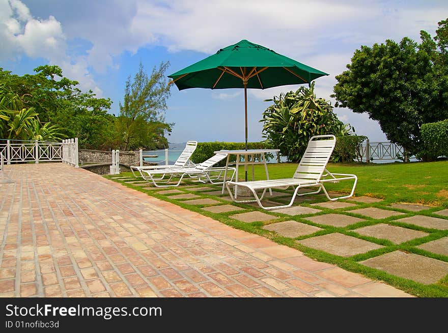 Lawn-chairs By Poolside