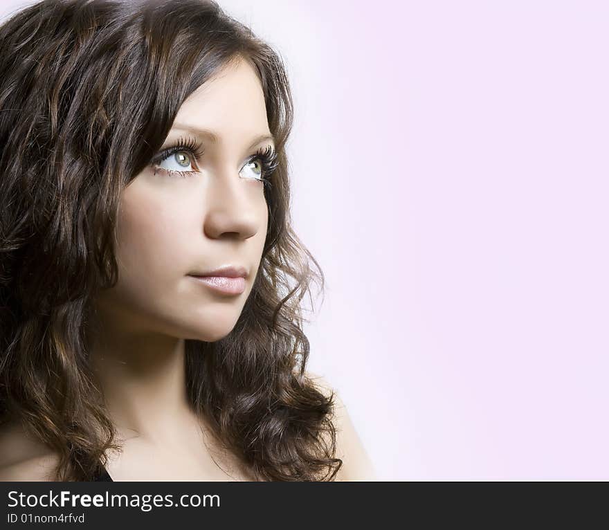 Beautiful fresh brunette portrait in studio shot