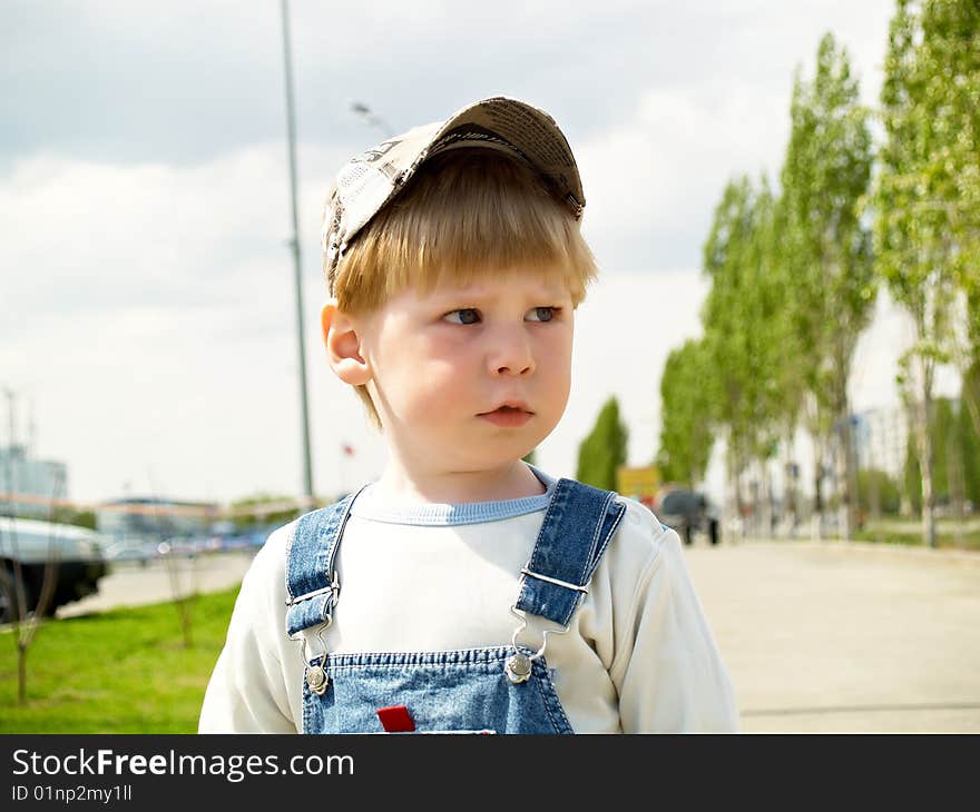 The boy on walk in the spring. The boy on walk in the spring