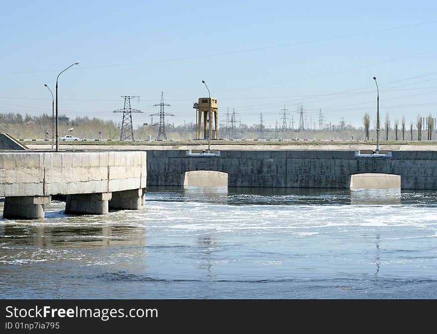 Tempestuous water beside hydroelectric stations