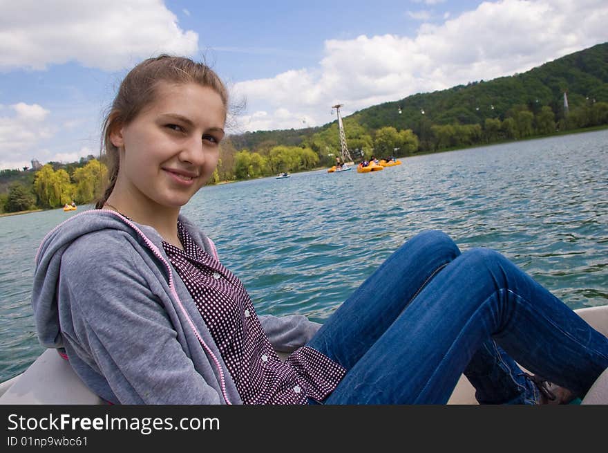 Girl on the lake. Go for a catamaran. Girl on the lake. Go for a catamaran.