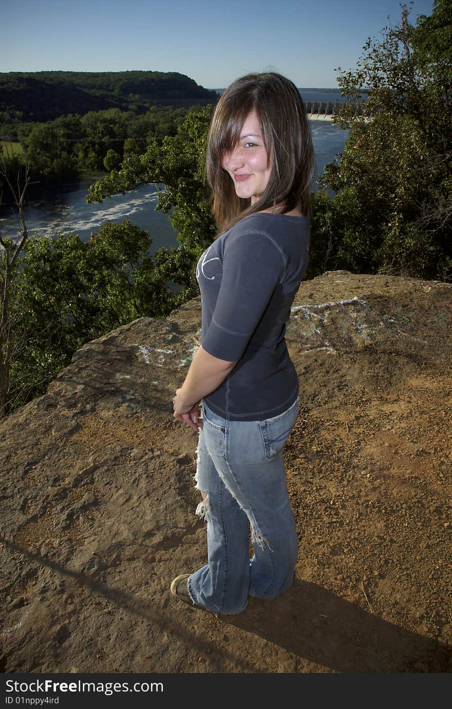 Playful Girl Above River