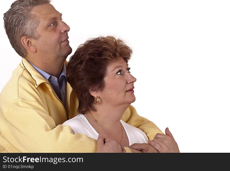 Closeup of a attractive married mature couple looking up. Closeup of a attractive married mature couple looking up