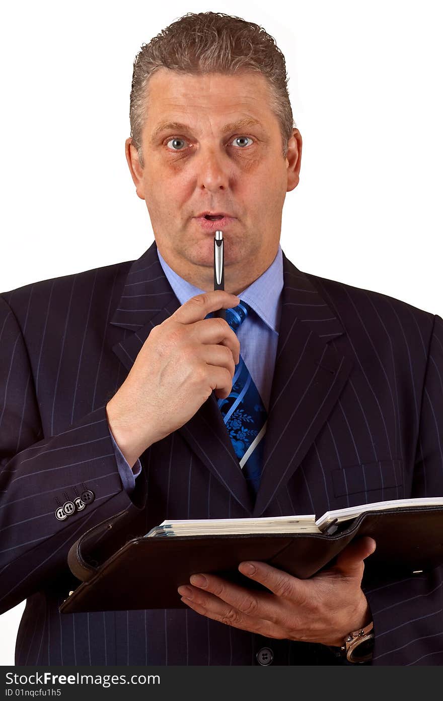 Portrait of a mature business man standing against white background. Portrait of a mature business man standing against white background