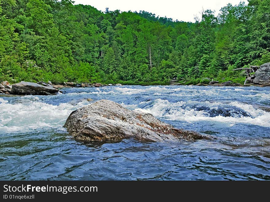 Large Rock In River Rapids